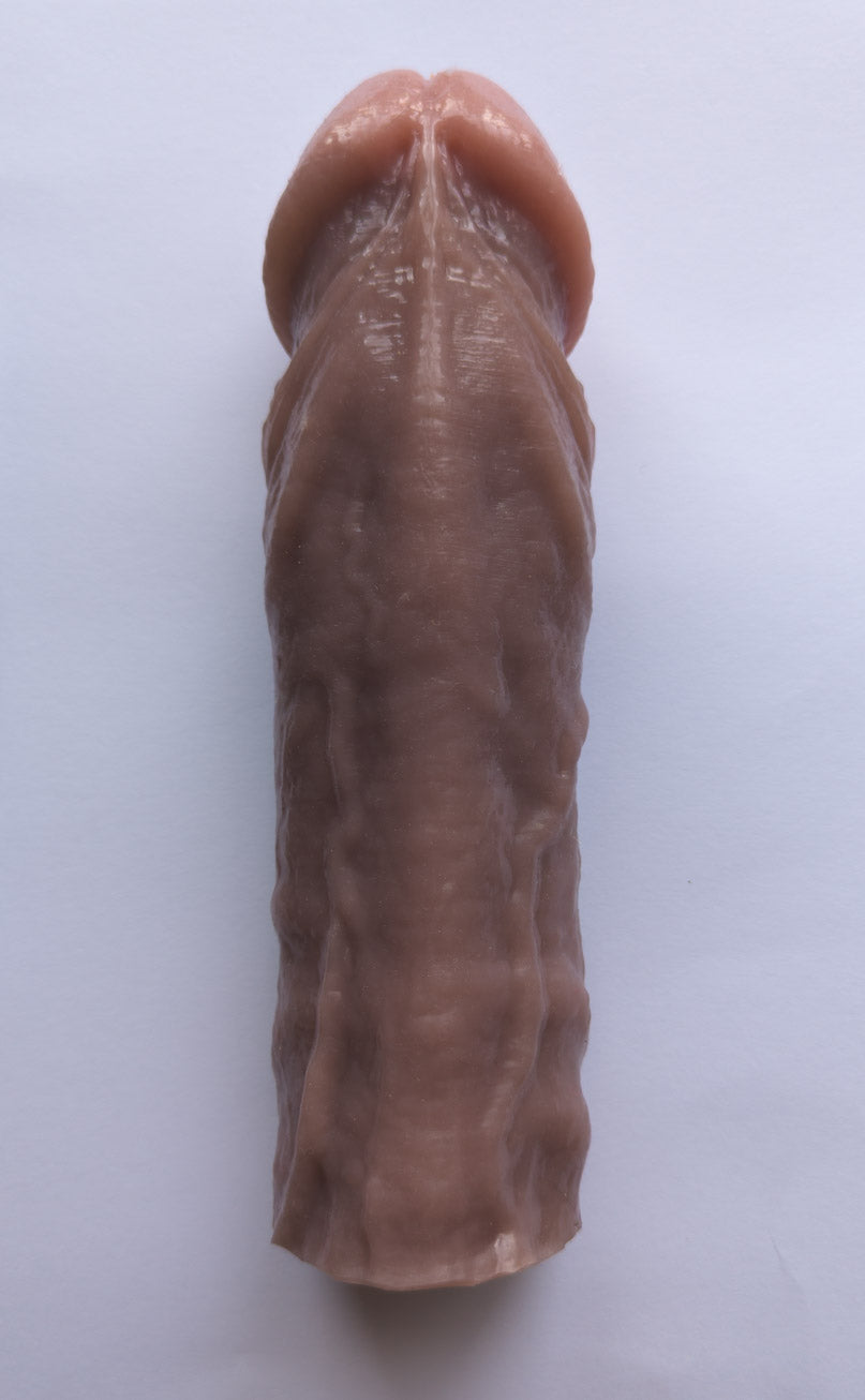 Realistic 9" penis sleeve/strap on - modeled after a real guy